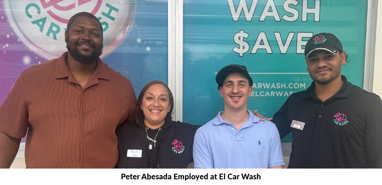 Young adult with special needs working at El Car Wash in Miami, Florida